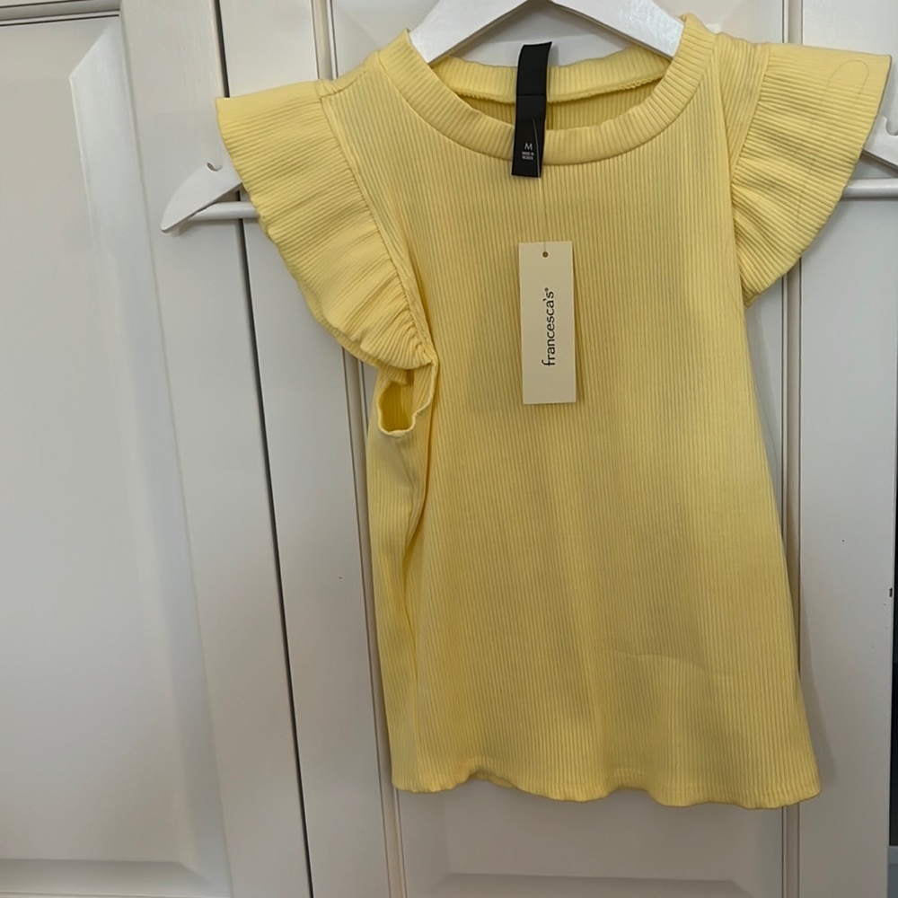 NWT Francesca’s light yellow ruffle top medium